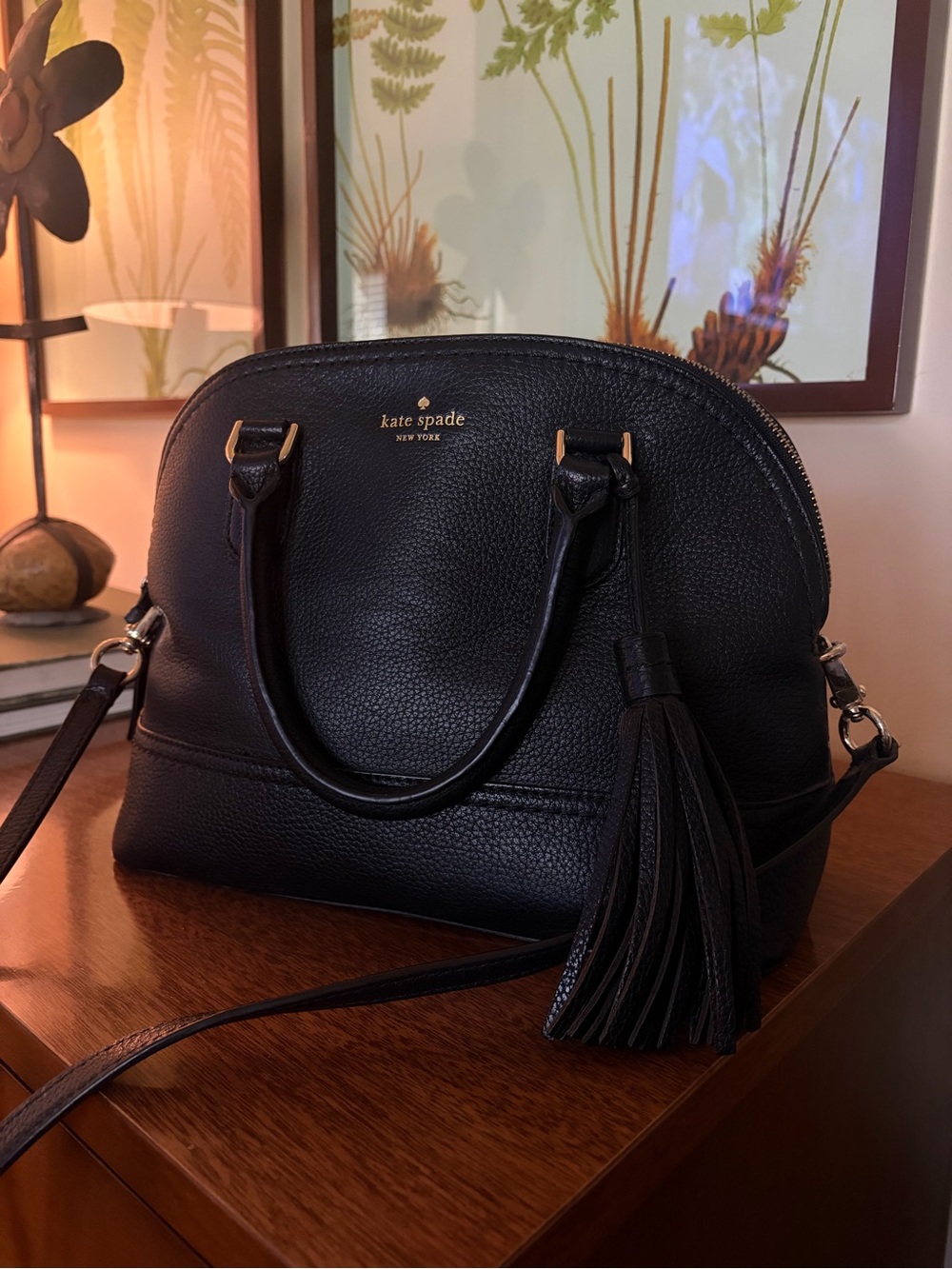 Kate Spade black leather dome crossbody with tassel